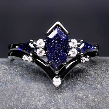 Women's black sterling silver coffin kite blue sandstone bridal set with a curved band, close crop