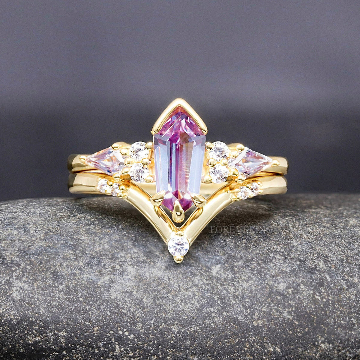 Women's gold sterling silver bridal set with a kite-cut alexandrite and V-shaped band, front view