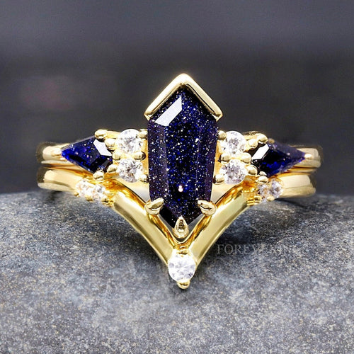 Gold sterling silver bridal set with a coffin kite cut blue sandstone and curved V band