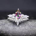 Women's sterling silver bridal set with a kite-cut mystic topaz and marquise side stones, straight on