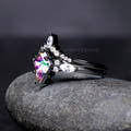 Meteorite inlay couples rings with black mystic topaz gemstone