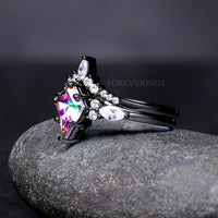 Meteorite inlay couples rings with black mystic topaz gemstone