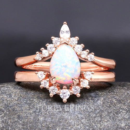 Women's vintage-style rose gold sterling silver pear white fire opal bridal set, straight on