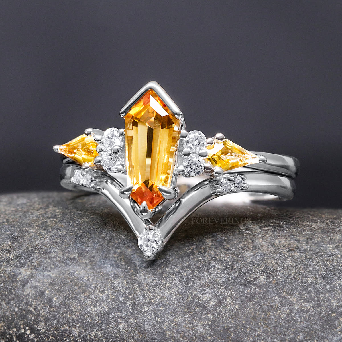 Women's sterling silver bridal set with an elongated hexagon citrine and curved band, straight on