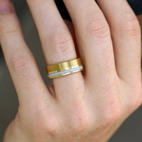 Couples matching gold opal tungsten rings with stacking star design