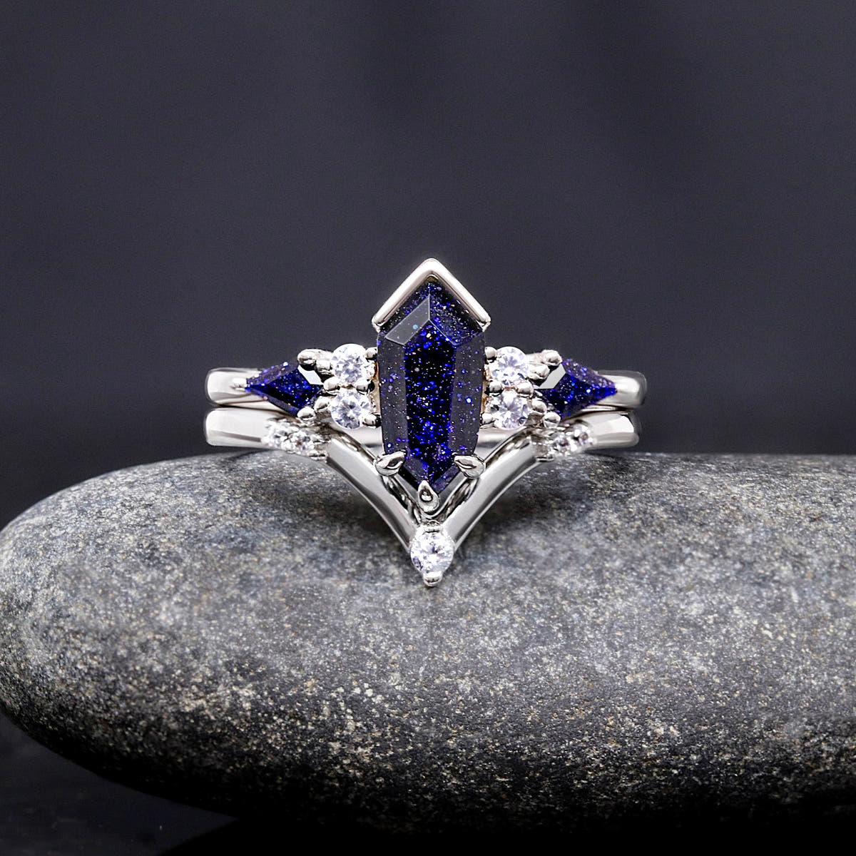 Women's blue sandstone engagement ring and chevron band in sterling silver, with kite side stones