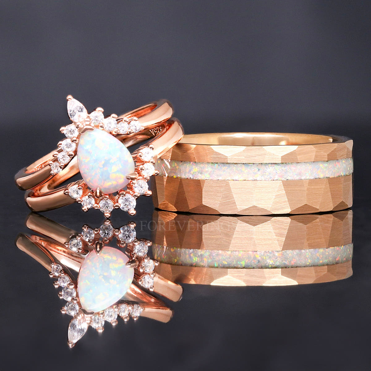 Matching rose gold couples ring set with pear white fire opal engagement ring and 8mm hammered tungsten band