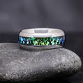 Men's 8mm silver tungsten wedding band with green and blue Rosette nebula inlay, standing upright