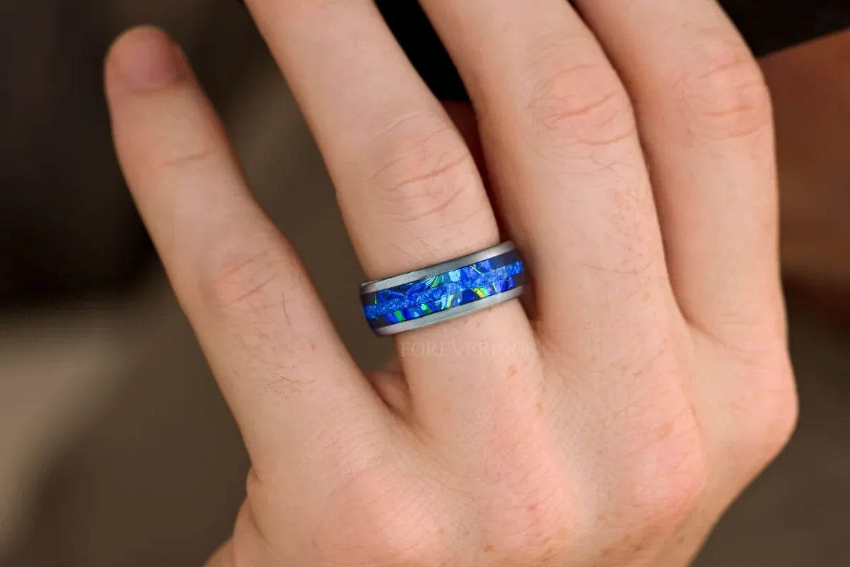 Men's exotic material ring with blue inlay in silver tungsten on hand
