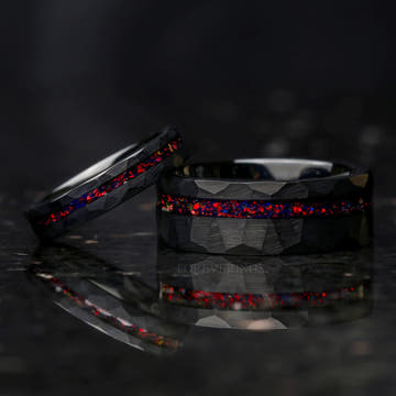 Matching hammered black tungsten couples ring set with black fire opal inlays, her 4mm band offset, 8mm and 4mm