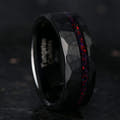 8mm hammered black tungsten ring with a black fire opal stripe, standing upright
