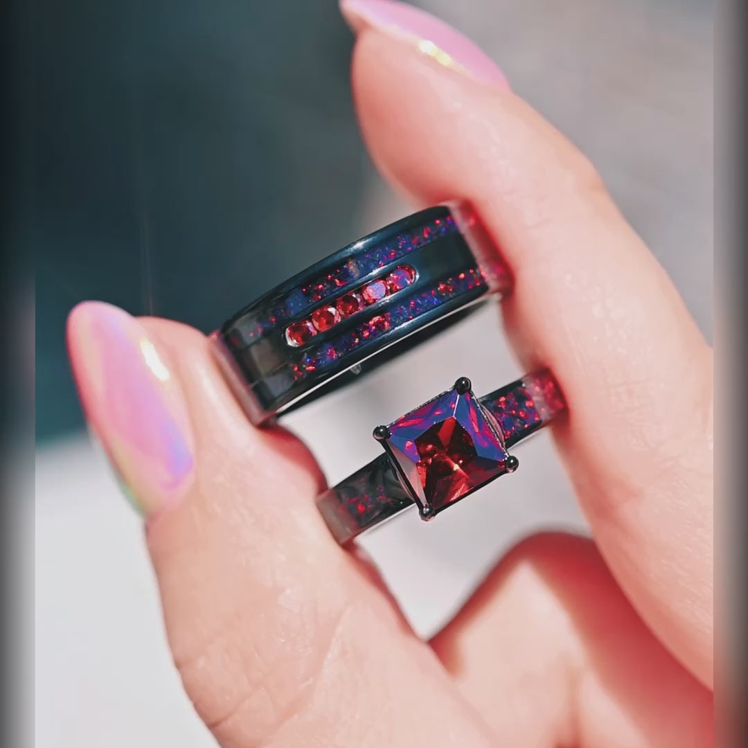 His and hers black engagement ring set with fire opal and garnet