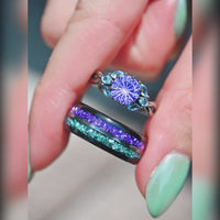 His and her matching engagement rings with Northern Lights design