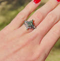 Black couples ring set with green moss agate, her kite ring and his 8mm tungsten band turning in the light