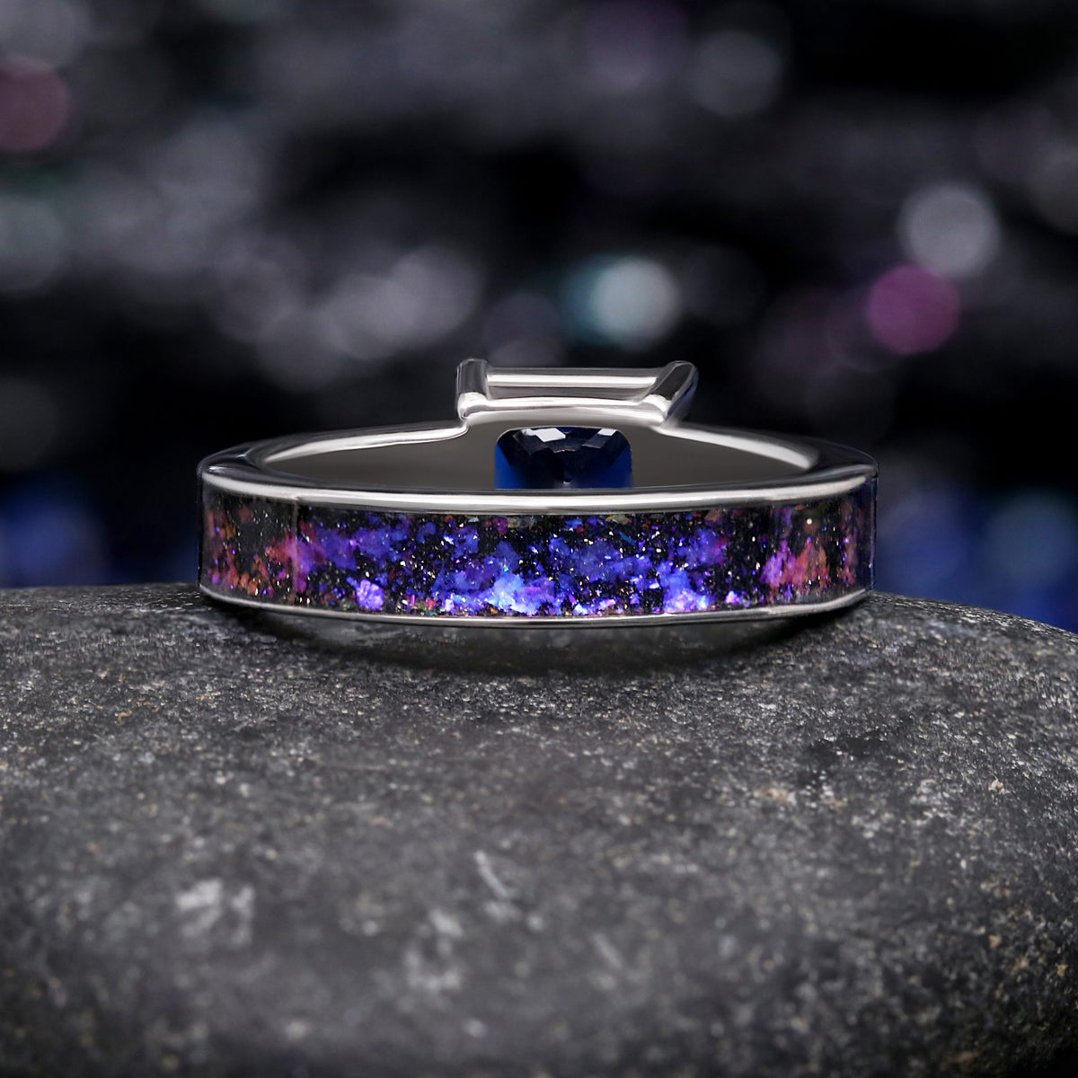 Back of the women's sterling silver sapphire ring with Orion nebula inlay, stone seen through the setting