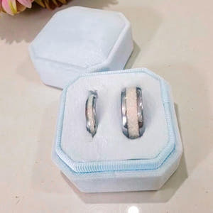 Matching silver tungsten couples ring set with white fire opal inlay, 8mm and 4mm, in a light blue ring box